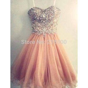 Peach knee length homecoming/prom dress